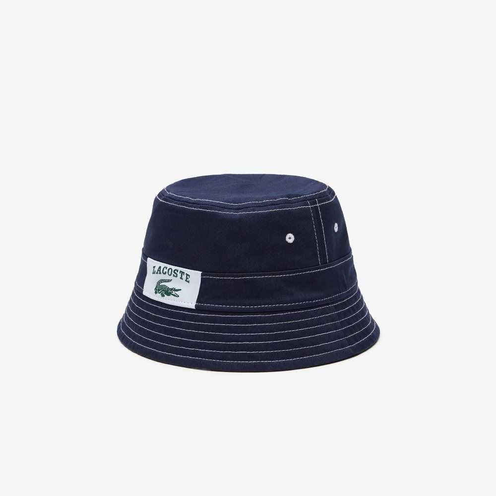 Lacoste Heritage Reversible Print Or Solid Cotton Bucket Hat Navy Blue / White | SLG-314086