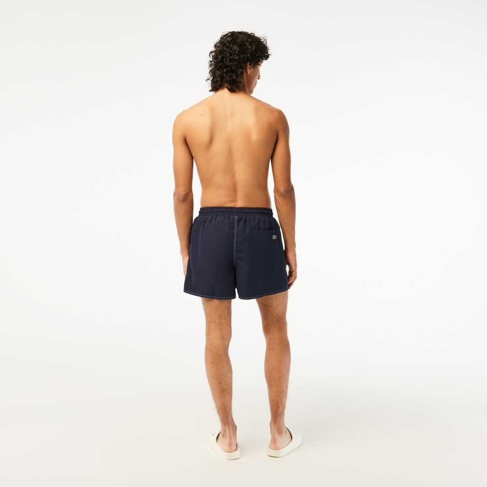 Lacoste Quick-Dry Swim Trunks with Integrated Lining Navy Blue | TSX-981257