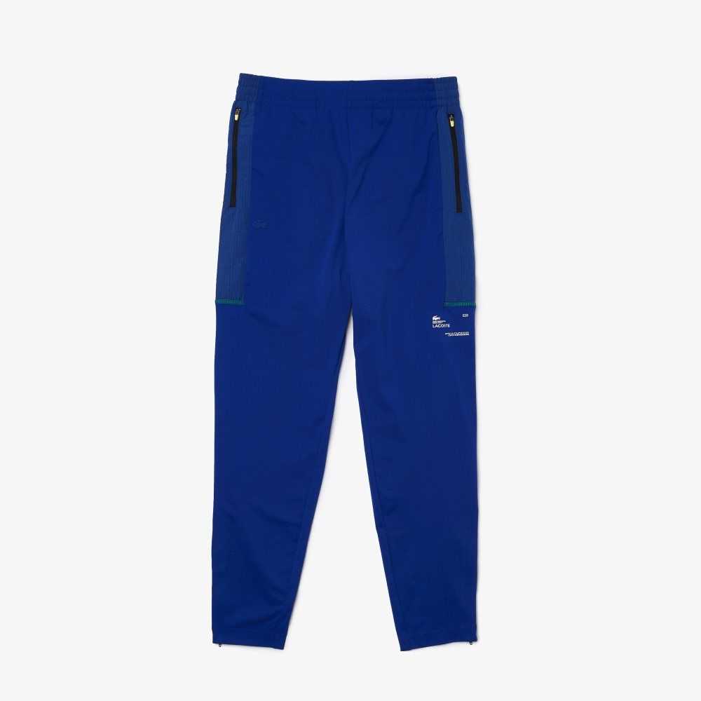 Lacoste SPORT Zip Pockets Tapered Tracksuit Pants Blue / White | KVJ-478952